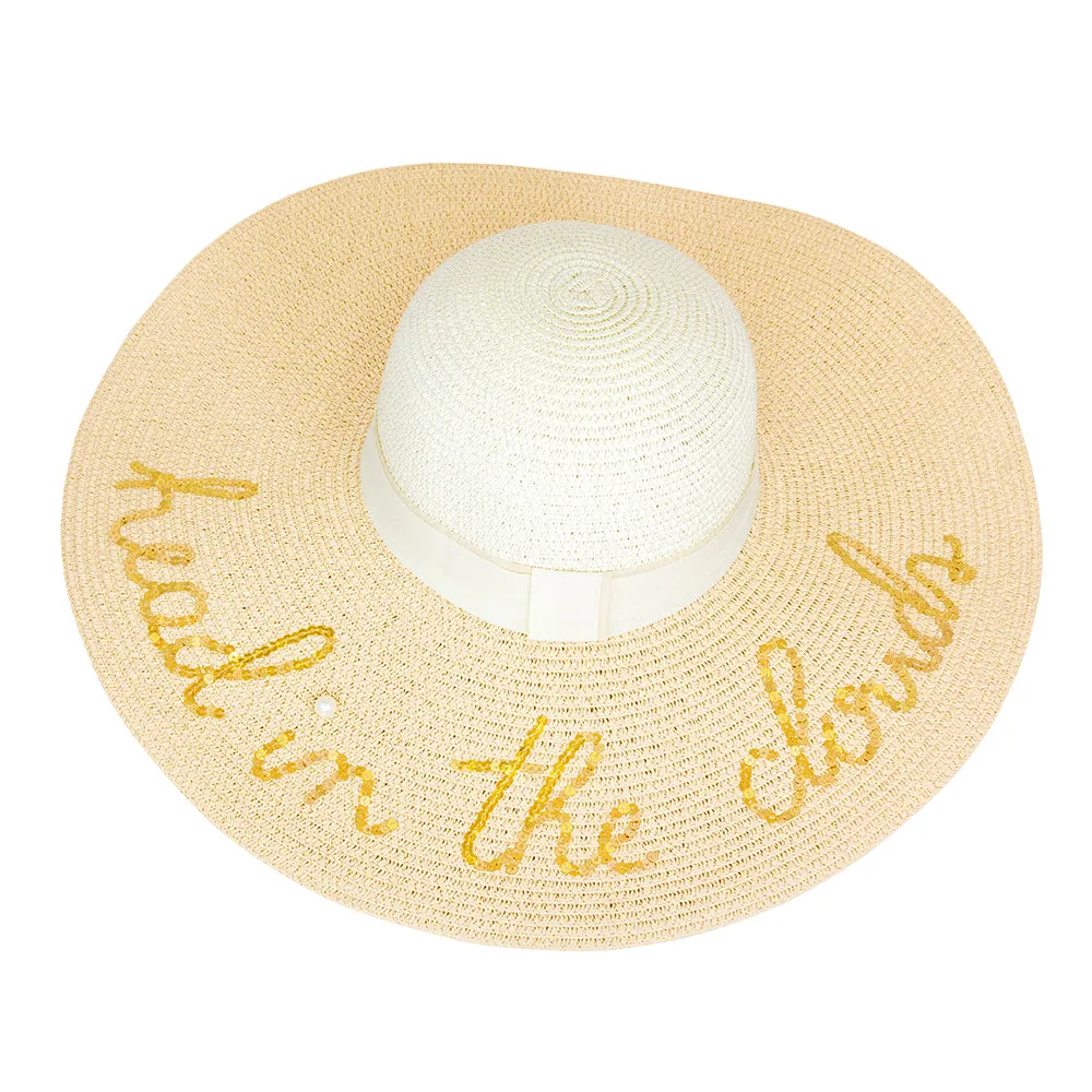 Beige straw beach hat. Head in the clouds...