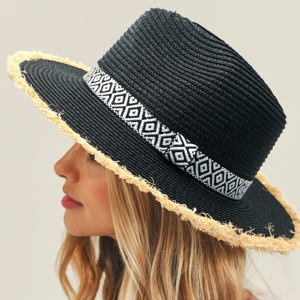 BLACK STRAW PANAMA HAT WITH BLACK AND WHITE AZTEC BAND AND FRAYED EDGES