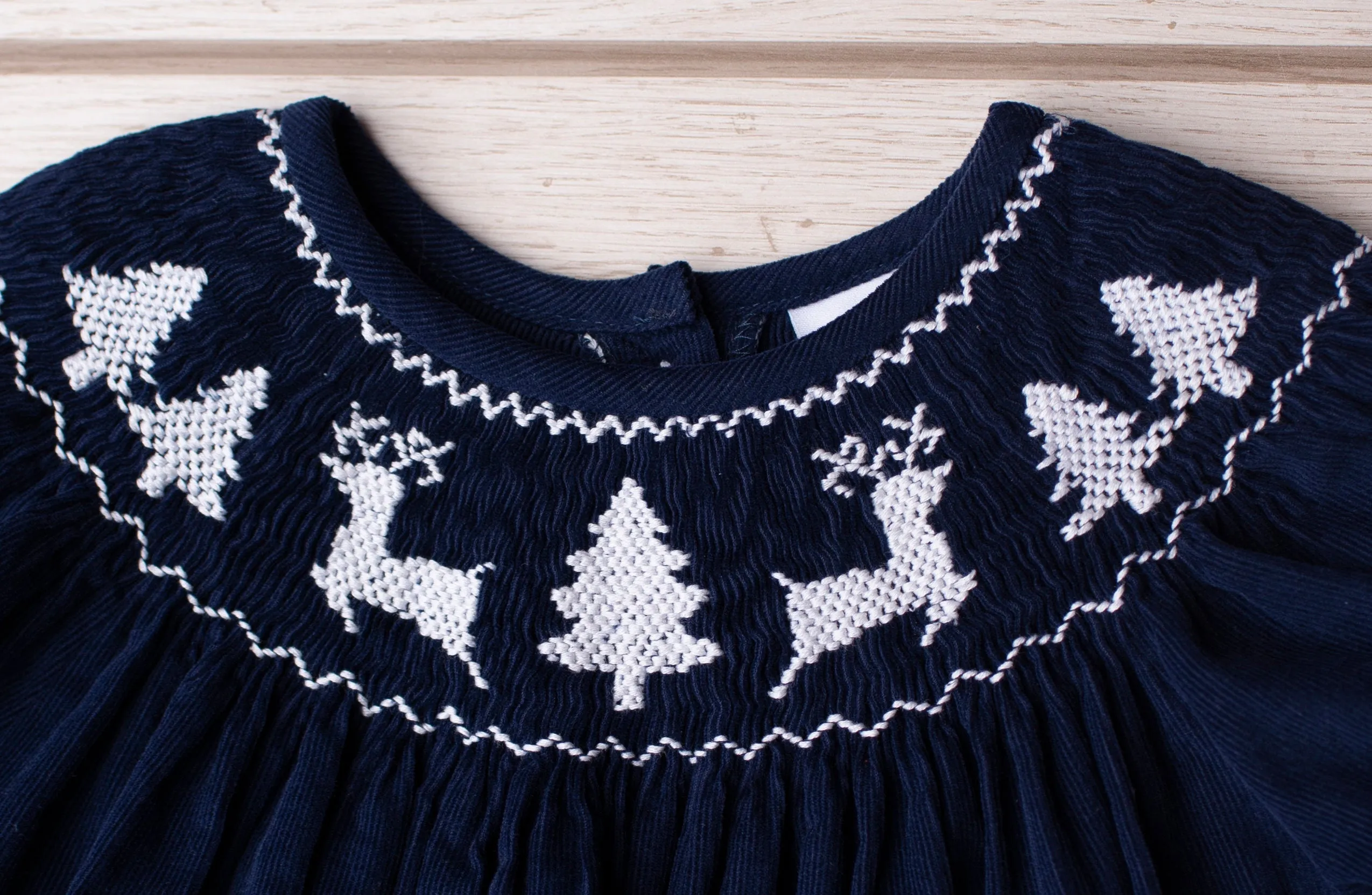 WINTER WONDERLAND SMOCKED DRESS NAVY