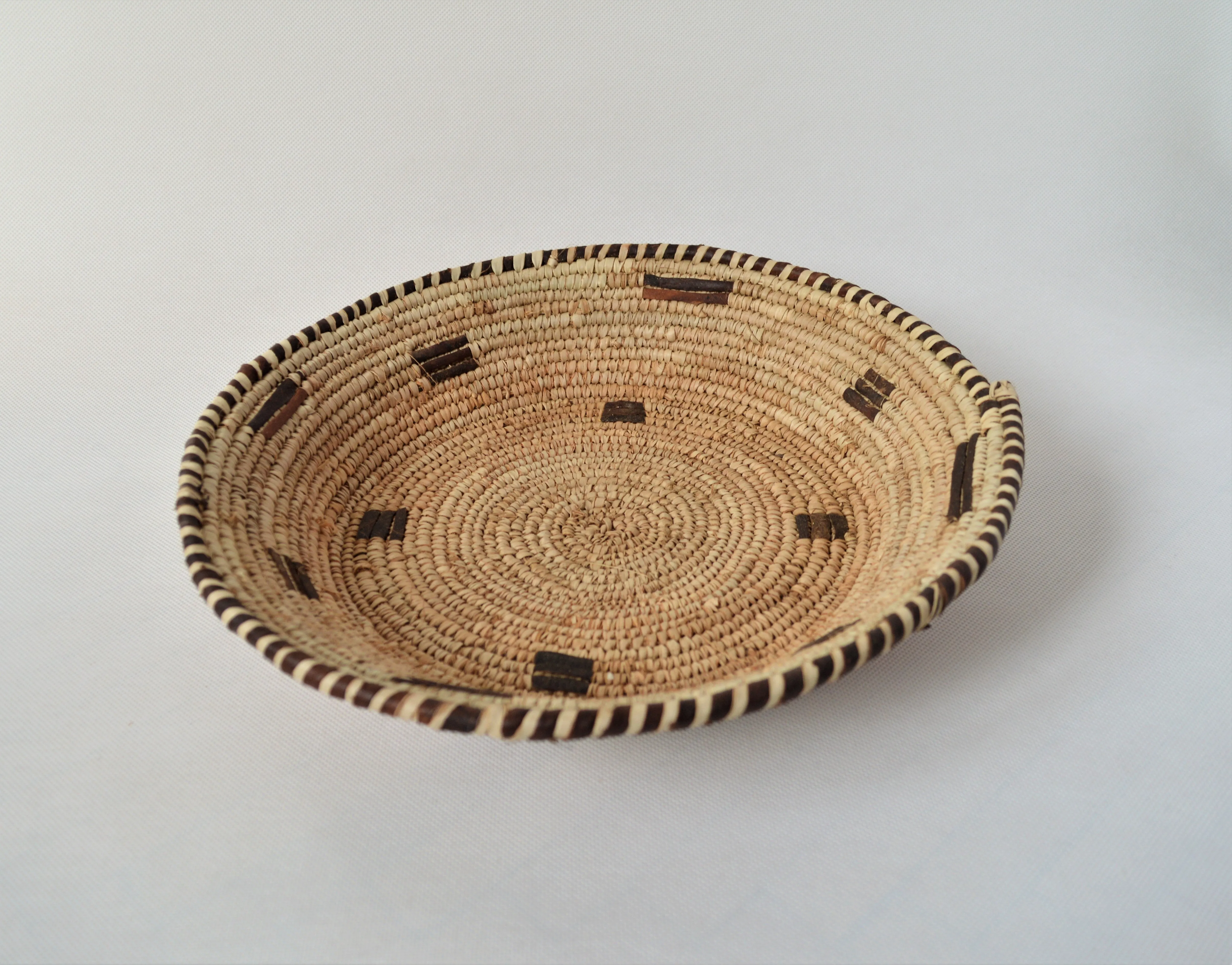 Woven straw and leather plate